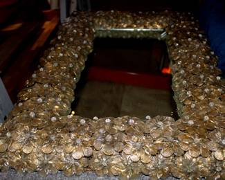 Gold flowered mirror 24in by 36in absolute master piece with gorgeous individual glass flowers enframing the whole piece 