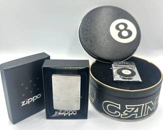 New In Box Zippo Lighters: Camel 8 Ball & Plain
Lot #: 39