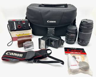 2 Canon Camera Lenses, Flash, Ihagee Waist Level Viewfinder & Other Photography Equipment In Canon Bag
Lot #: 61
