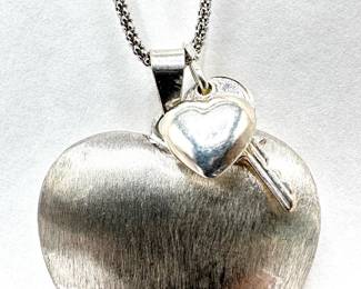 Sterling Silver Heart With Small Heart & Key Pendant Necklace, Reads "open Your Heart" In Italian
Lot #: 97