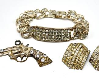 Vintage Rhinestone Bracelet, Shoe Clips & Gun Pendant
Lot #: 56