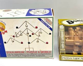 2 New In Box Vintage Brain Teaser Puzzles By The Bamboozler's Rge & Equilibrium
Lot #: 128