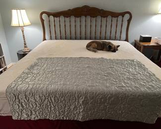 King size bed and king size mattress, boxspring, and extra thick pad on top. The dog is not included.!🐶