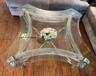 Pretty glass top Coffee Table it has beveled curved edges!