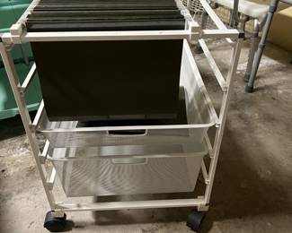 ELFA filing system from the container store with two drawers below, and it is on wheels!