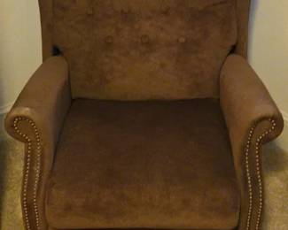 Brown Fabric Reliner With Nail Head Trim