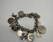 Vintage Sterling Silver Charm Bracelet Loaded With Various Charms | Total Weight 62 grams