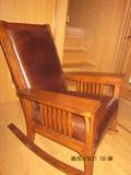 2 matching Frank Lloyd Wright style rocking chairs.