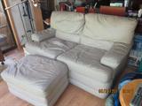 Cream loveseat and ottoman