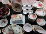 Hand Painted China, hand painted Poppie's, serving for 6 and many serving dishes.