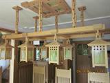 Arts and craft chandelier with wood chain.