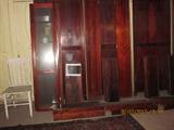 Large book shelf in picture before, disassembled and layed out here. 6 glass doors