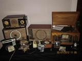 tube radios, transitor radios, Crosley reproduction radio/record player, vintage kitchen clocks