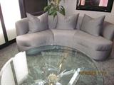 2 matching loveseats, glass coffee table,