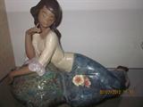 Lladro's, many large sizes and a few small.