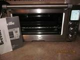 Breville Smart Oven, Stainless steel toaster oven and more, used once - maybe.
