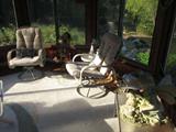 Patio set, many pieces kept in a gazebo.