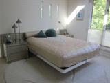 Contemporary Bedroom Set: Platform bed with headboard and nightstands, matching 3 piece dresser/chest unit.