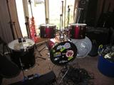 Drum set, microphone stands, band equipment