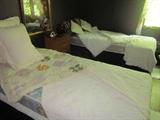Twin beds, vintage bedspreads