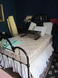 Queen cast iron bed frame and mattresses