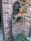 Wall Sconce not for sale. Cast Iron Hitching Post for sale.
