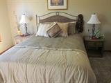 Wicker end tables, matching wicker queen headboard, mattresses, bed linens