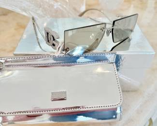 DG sunglasses with case cert and box still selling at Neiman Marcus for 4,000.00