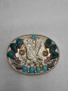 Navajo Sterling Silver And Jeweler's Gold Eagle Belt Buckle With Turquoise Stones. Total Weight 87.3 grams