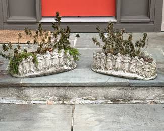 PAIR CONCRETE FIGURAL PLANTERS | Cast garden planters with continuous relief of dancing classical figures encircling the exterior; heavy
Dimensions: h. 9 x w. 25 x d. 13 in (each)
