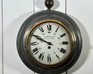 A. MARTENS & Cie. FRENCH PARCEL GILT TOLE WALL CLOCK | Whimsical, in the form of a pocket watch, with Roman numeral markers
Dimensions: h. 18.5 x dia. 15.5 in
