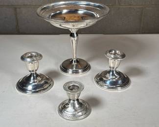 (4pc) Misc. Sterling Weighted Objects | Including three weighted candle stick holders (including a pair and a single), and a weighted compote / candy dish
Dimensions: h. 6.5 x dia. 7 in (Candy dish, Diameter at top)
