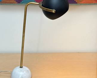 Stilnovo Style Mid-Century Marble & Brass Desk Lamp | Italian modernist style desk lamp in the manner of Stilnovo, featuring a black domed shade on a bent brass arm mounted to a white marble base
Dimensions: h. 25.5 in