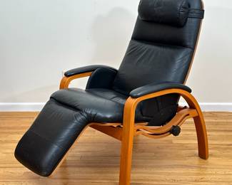 VINTAGE "ZERO GRAVITY" MID CENTURY BLACK LEATHER RECLINER | Bent figured plywood, distressed black leather, with lumbar and position adjustment. Dimensions: h. 43 x w. 28.5 x l. 41 in (approx., adjustable)
