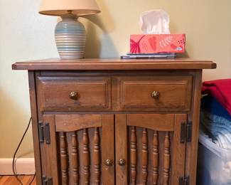 Bedroom nightstand with doors and storage space inside