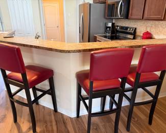 3 red bar stools