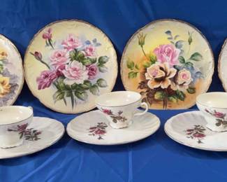 China Floral Medley Teapot And Four Cups Saucers And Four Decorative Hanging Plates
