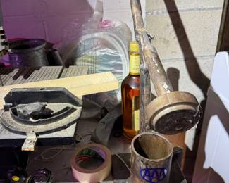 work area behind basement stairs.