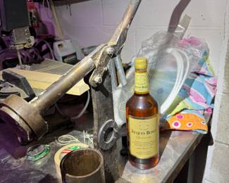 work area behind basement stairs.