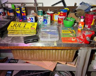 work area behind basement stairs.