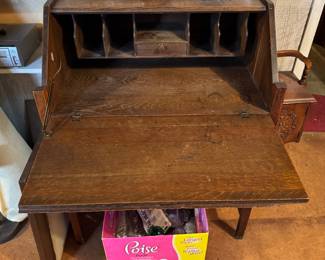 basement room to the right of the basement stairs.