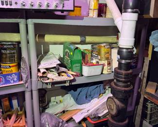 work area behind basement stairs.