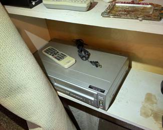 basement room to the right of the basement stairs.