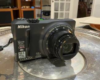 Nikon Coolpix S9100 12.1MP Digital Camera with 18x Wide Optical Zoom (includes battery / no charger)