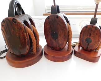 Antique block & tackle lamps.