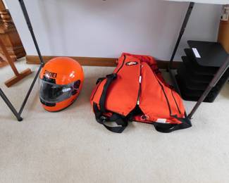 Racing helmet and life vest.