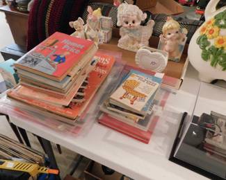 Vintage Books and baby planters.