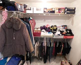 Ladies clothing, house shoes, socks. Most with tags.