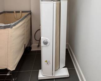 Miele Touchtronic B990 Rotary Iron with Wide Width Roller, 3 Temperature Settings, Variable Roller Speed and Fold Away Design. For Commercial and Residential Use. Measures Open: 39 1/2" W x 16 1/2" D x 37" H; Closed: 19 1/2" W x 16 1/2" D x 41 3/4" H. Photo 1 of 3.