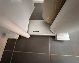 Miele Touchtronic B990 Rotary Iron with Wide Width Roller, 3 Temperature Settings, Variable Roller Speed and Fold Away Design. For Commercial and Residential Use. Measures Open: 39 1/2" W x 16 1/2" D x 37" H; Closed: 19 1/2" W x 16 1/2" D x 41 3/4" H. Photo 2 of 3.